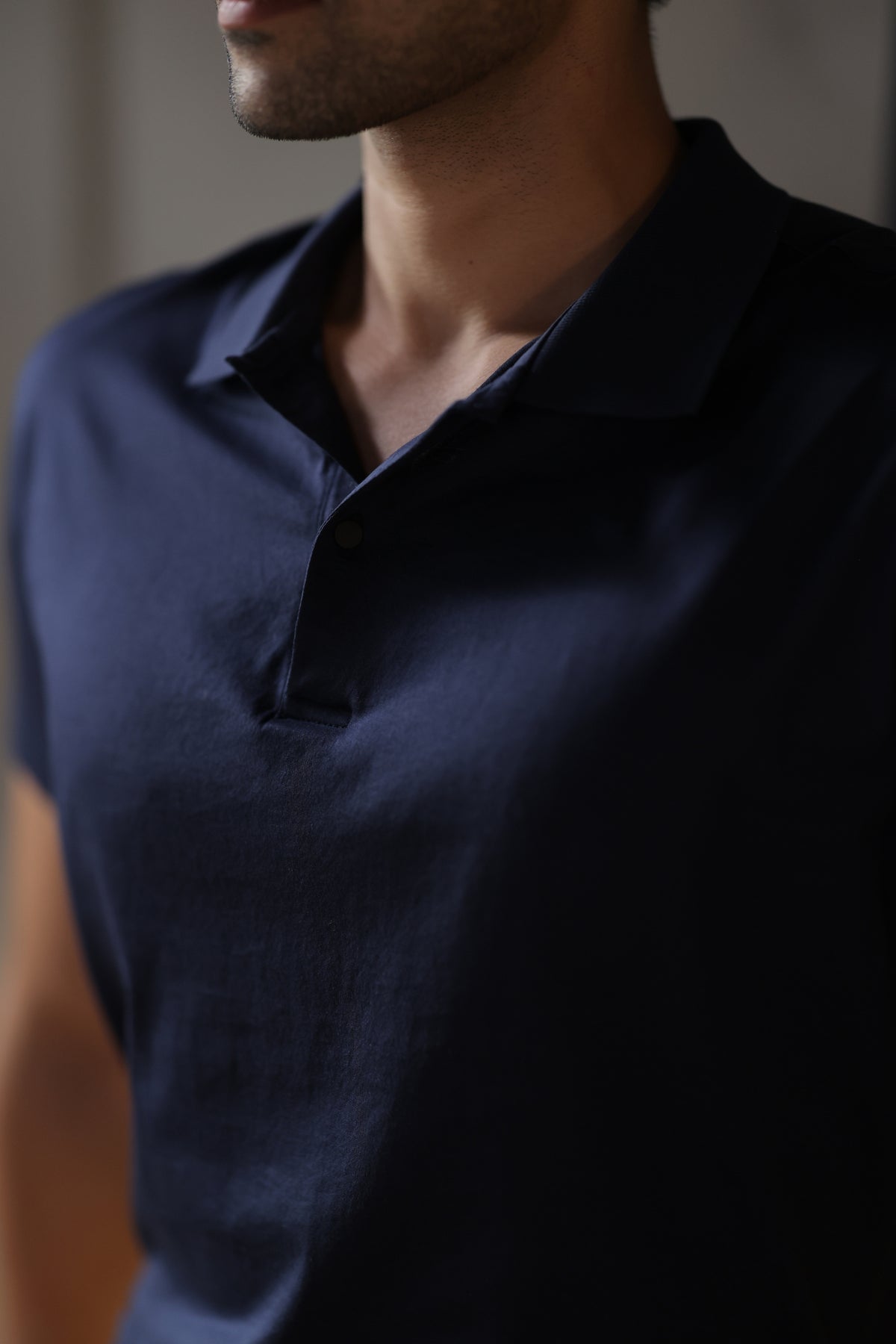 Navy polo collar detail
